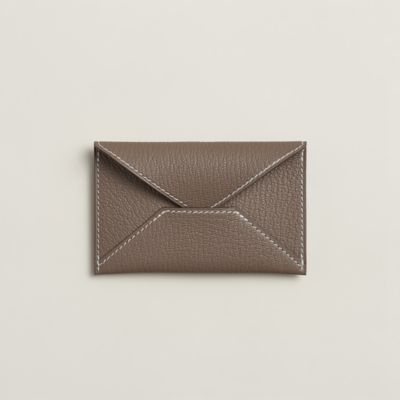 ポーチ 《エンヴェロープ》 PM - ベージュ | Hermès - エルメス-公式サイト