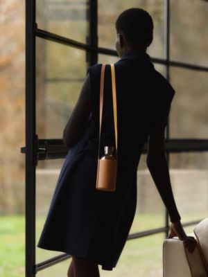 Flaneuse water bottle and shoulder strap, View: Worn, worn, view 2 of 6