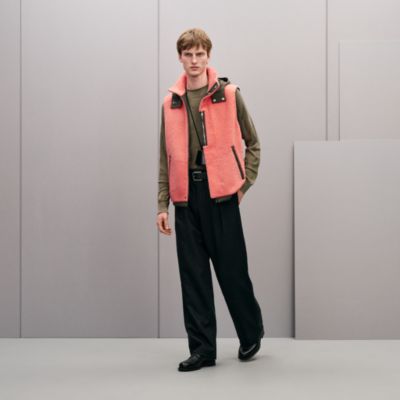 Reversible hooded vest