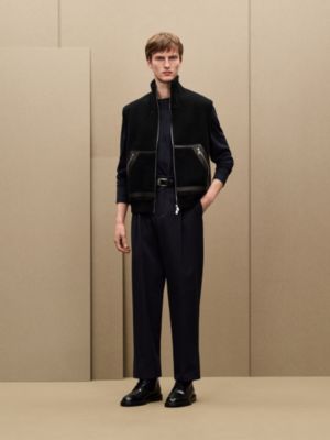 Vest with leather details	