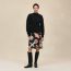 Buttoned sweater with "Ferronnerie" details, noir