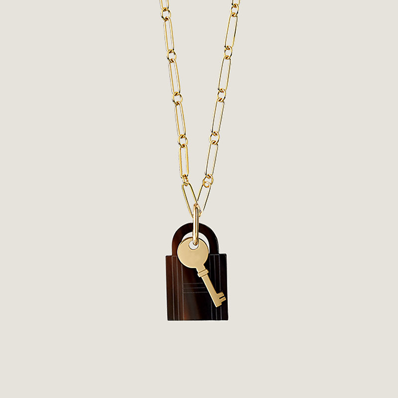 Hermes Brand New Amulette Padlock PM Brown Gold Necklace For Sale at  1stDibs | hermes necklace lock, jane birkin key necklace, hermes amulette  necklace