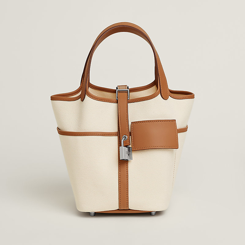 HERMES
エルメス
トップス
ショート丈 Hermès Picotin Cargo 18 Toile Goeland/Swift Orange H Palladium