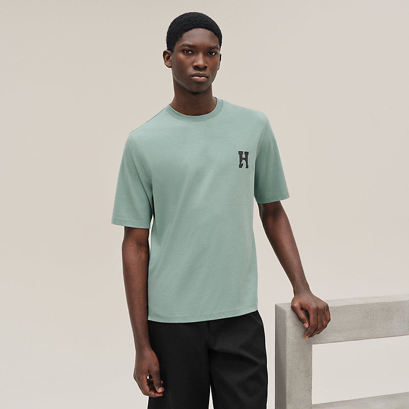 Camiseta com detalhe em couro 