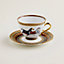 Cheval d'Orient tea cup and saucer, View: Worn, worn, view 1 of 3