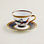 Cheval d'Orient tea cup and saucer, View: Worn, worn, view 1 of 3