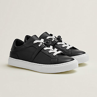 black trainers with bow