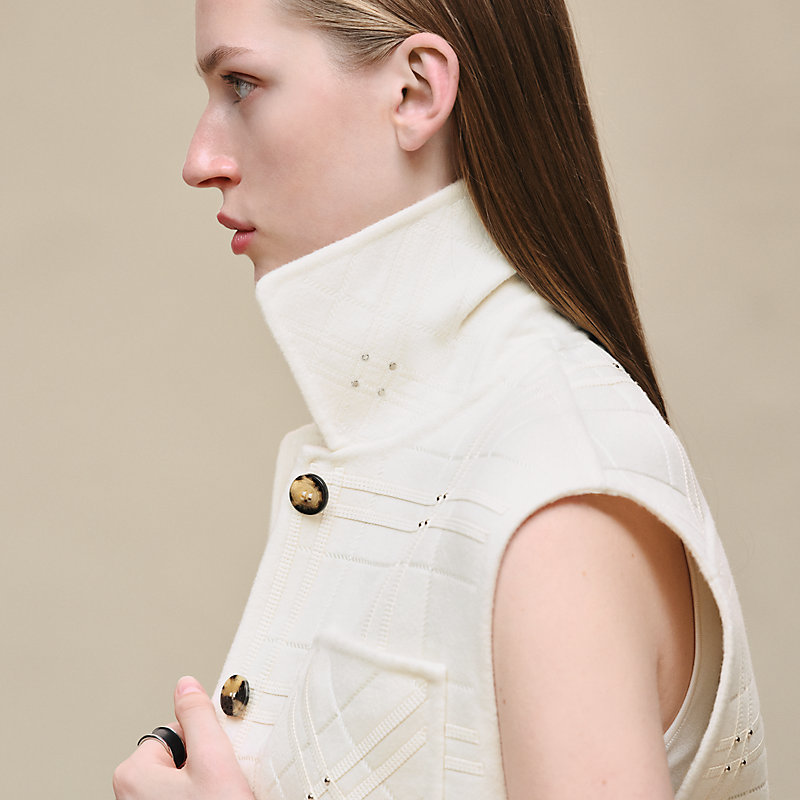 Embroidered short vest with leather detail