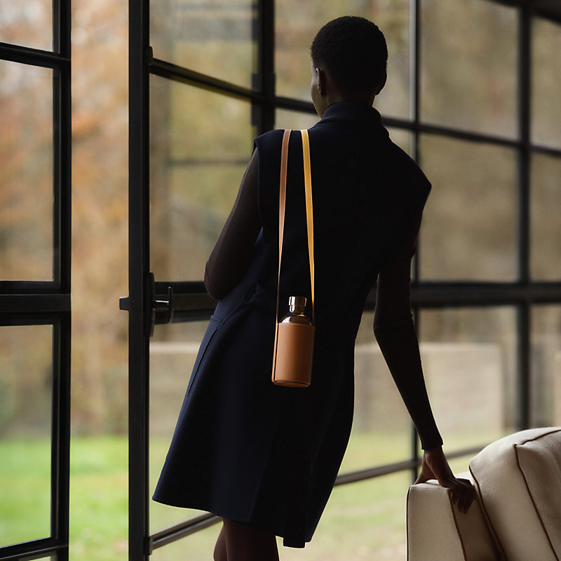 Flaneuse water bottle and shoulder strap