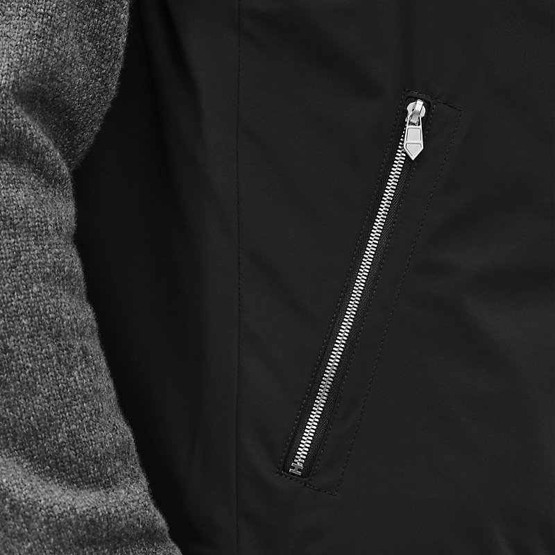 Gilet sans manches à capuche réversible