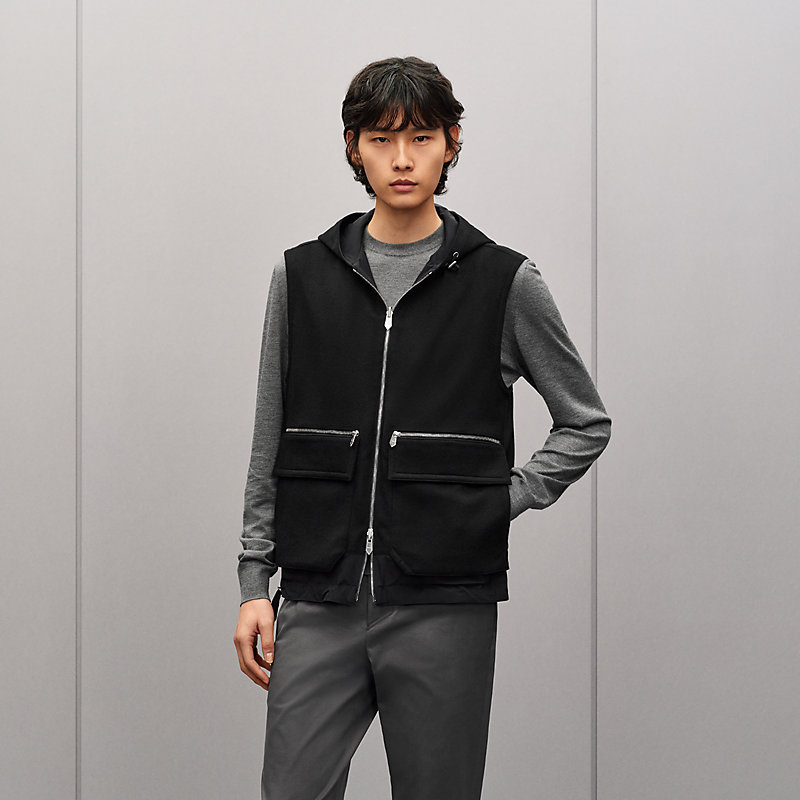 Gilet sans manches à capuche réversible