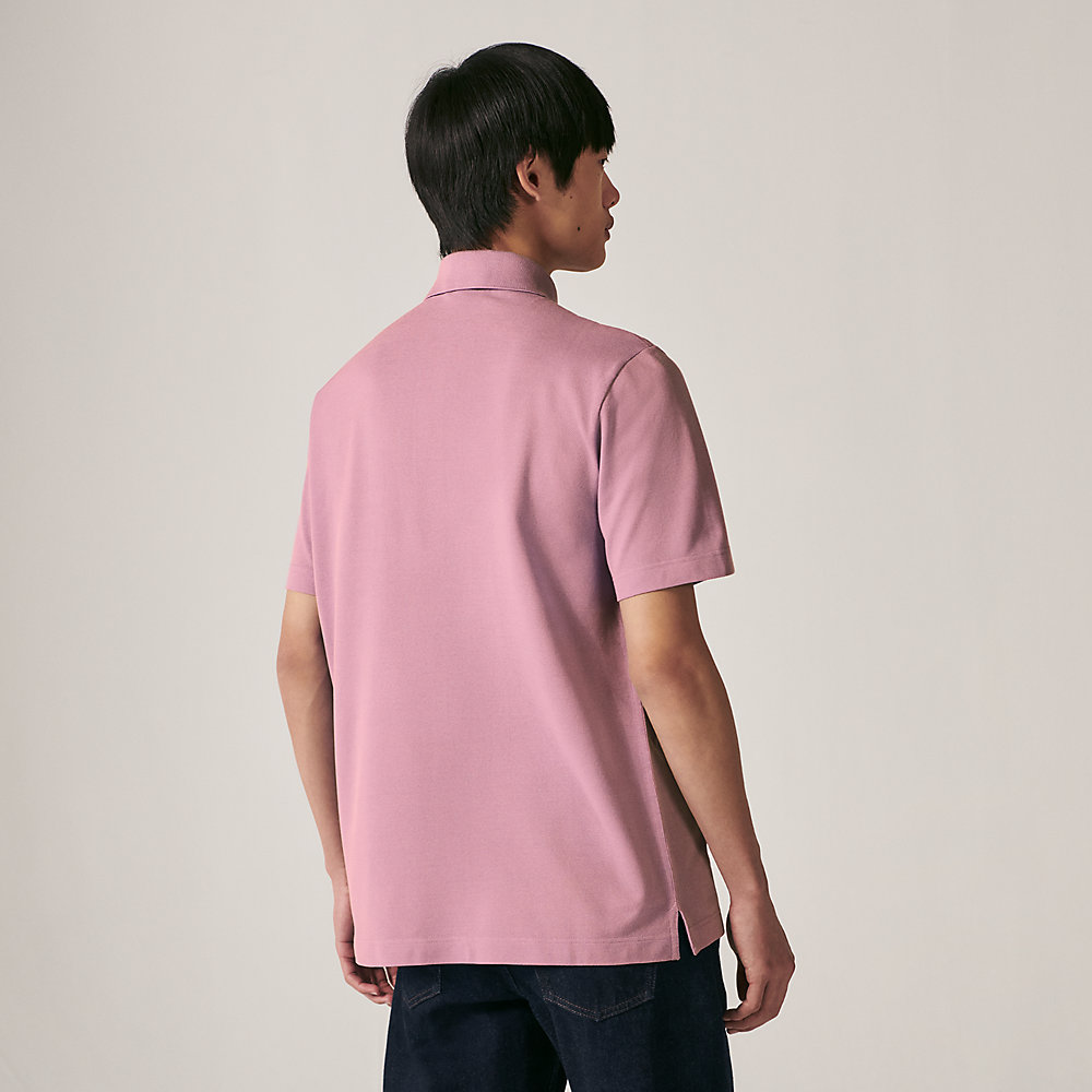 white polo shirt with pink horse