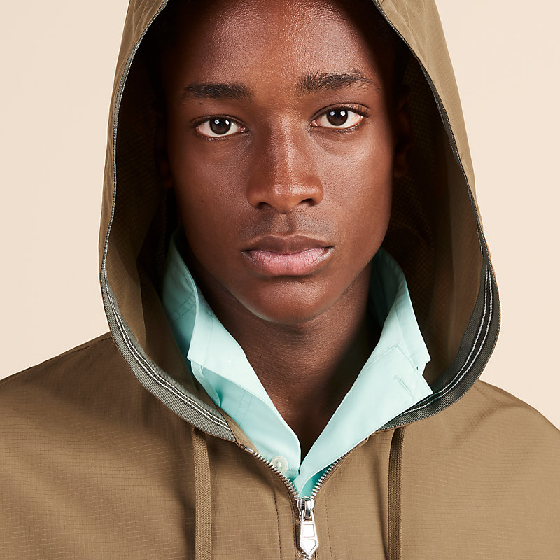 Hooded sweater with twisted ribbon