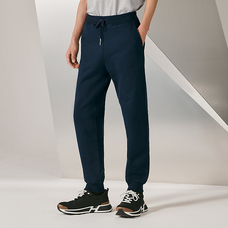 Jogging pants with leather detail | Hermès Canada