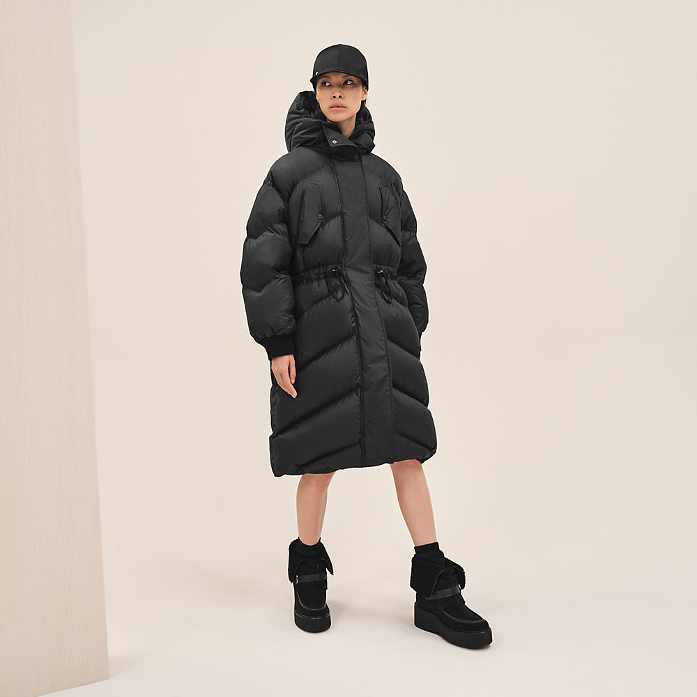 All Black Winter Outfit: Full-Length Puffer Coat With Slouchy Jeans and  Sock Boots | Winter outfits, Slouchy jeans, Black fall outfits