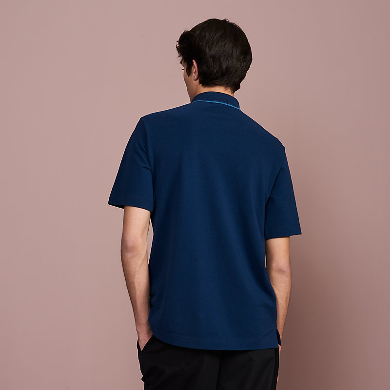 Polo shirt with pocket and striped collar