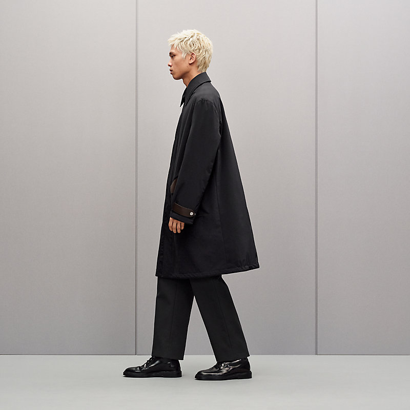 Raincoat with leather details