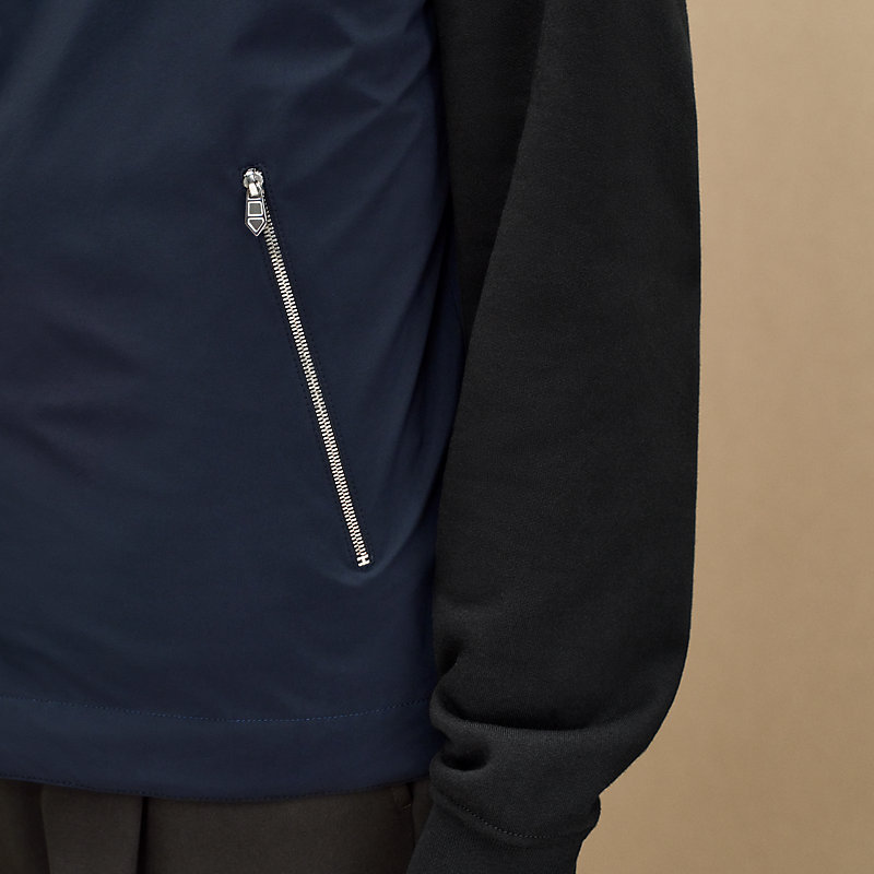 Reversible hooded vest