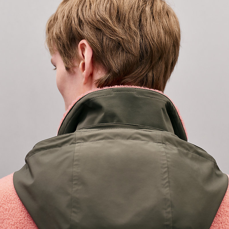 Reversible hooded vest