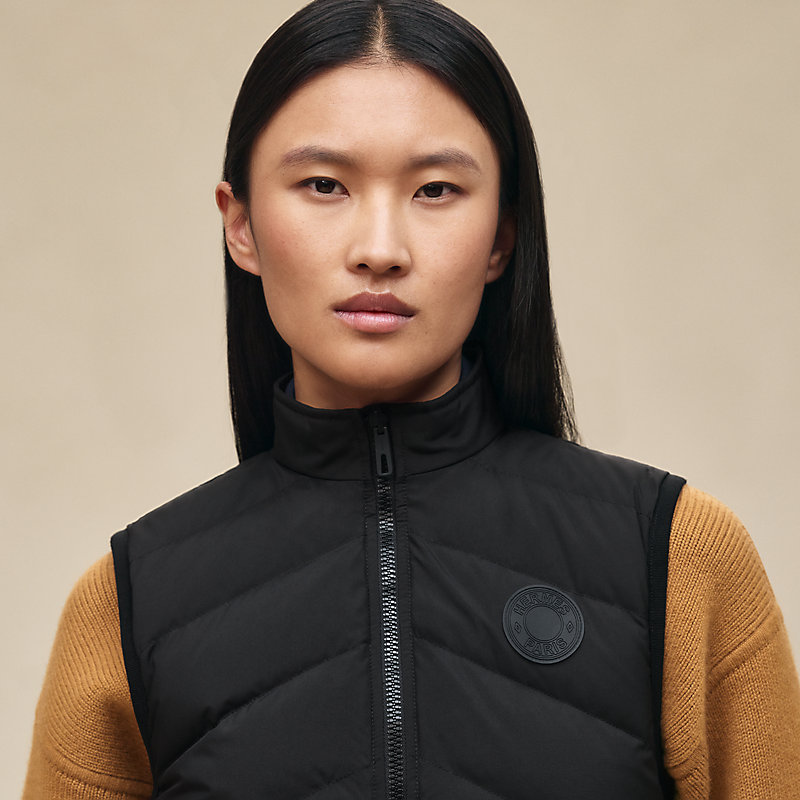 Reversible sleeveless jacket