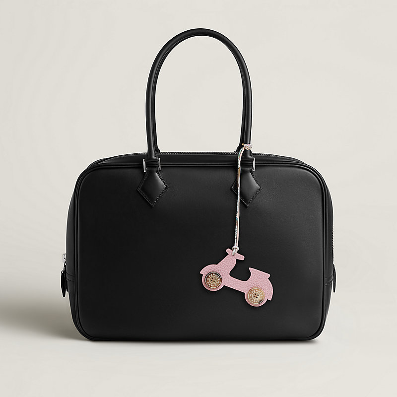 Scooter charm