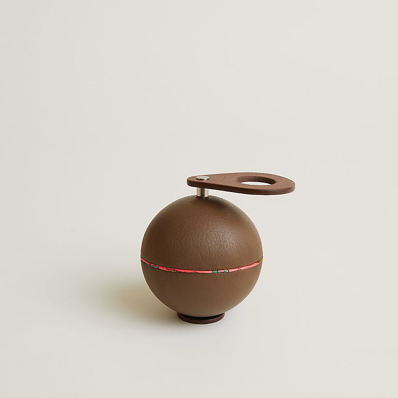 Spherical music box with a came key