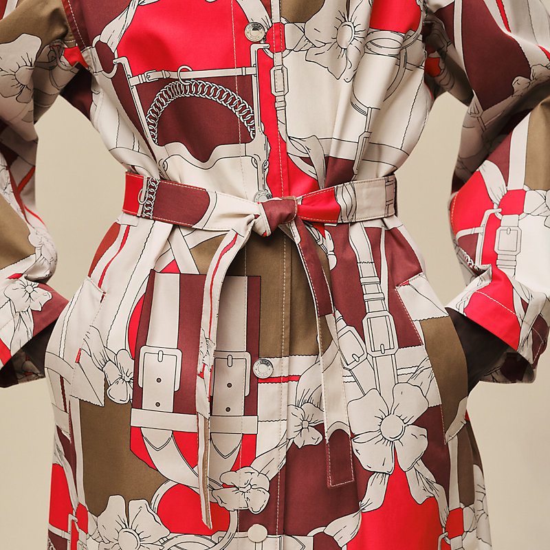 Trench lungo con stampa “Grand Manège”</p>