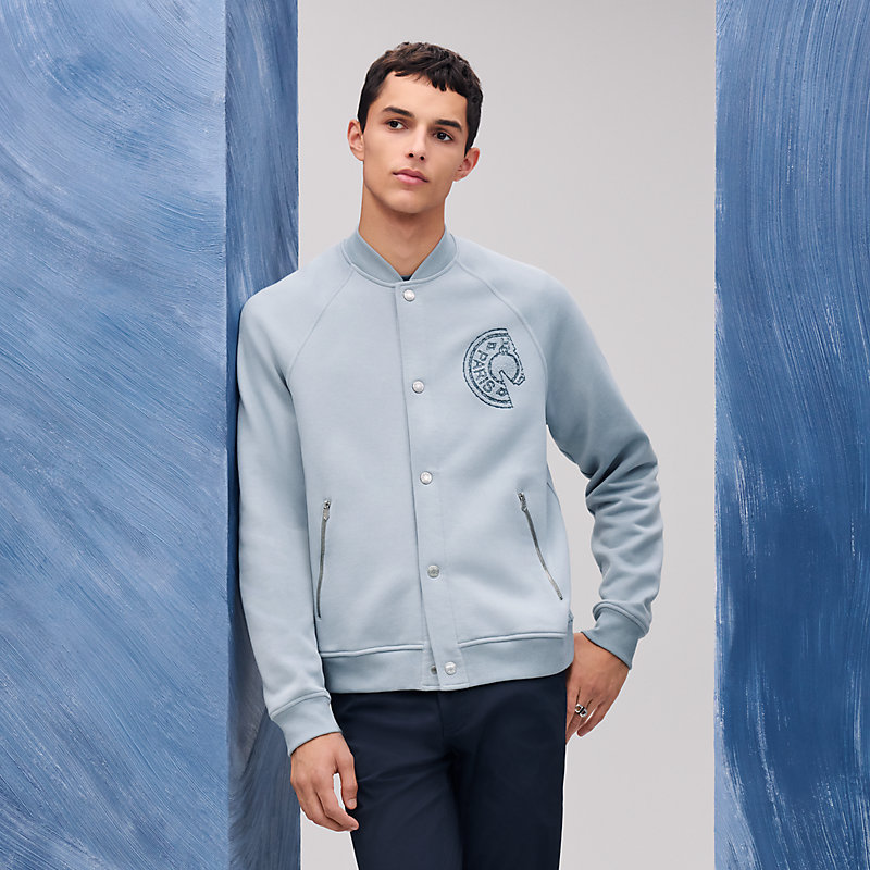 カジュアルに可愛HermesInspiration Varsity brodeジャケット Varsity jacket with Clou de Selle detail | Hermès Netherlands
