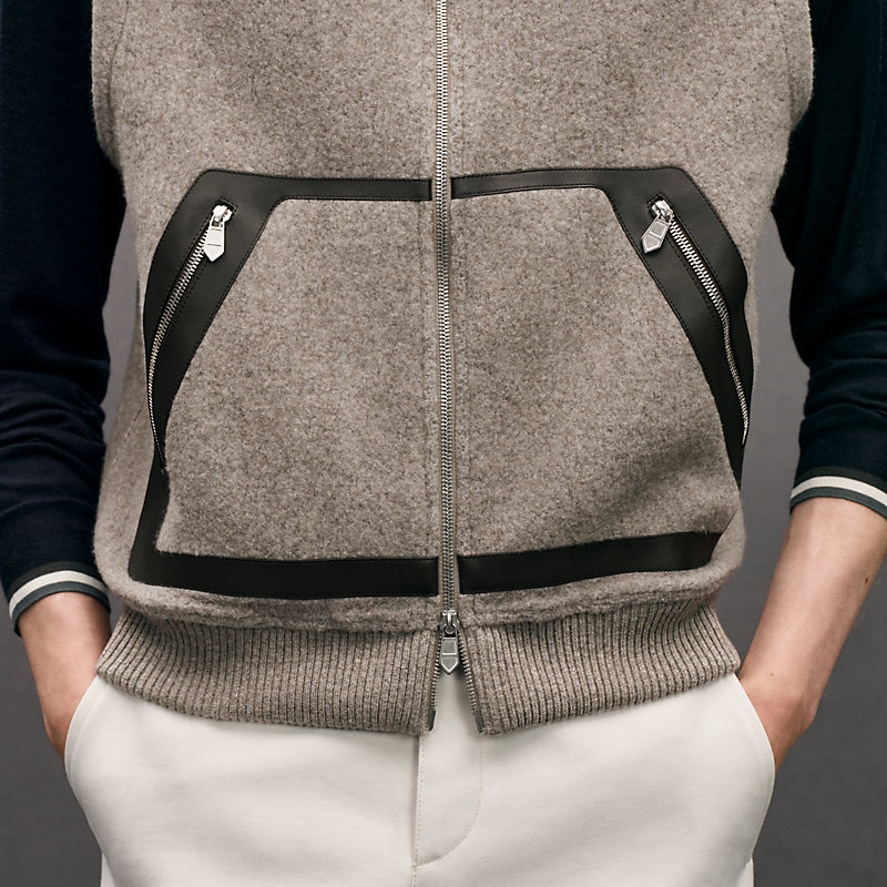 Vest with leather details	