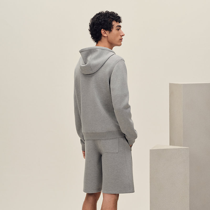 Voyage capsule hooded sweater