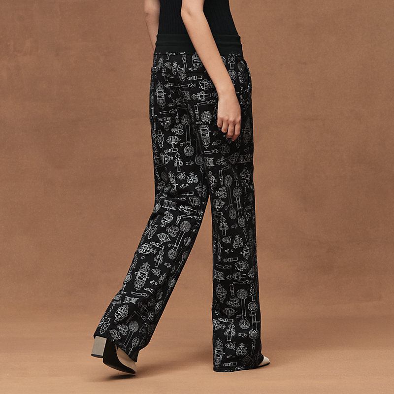 Weit geschnittene Hose mit "Ferronnerie Remix"-Print