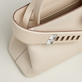 バッグ 《メドール》 スタッズ - レッド | Hermès - エルメス-公式サイト