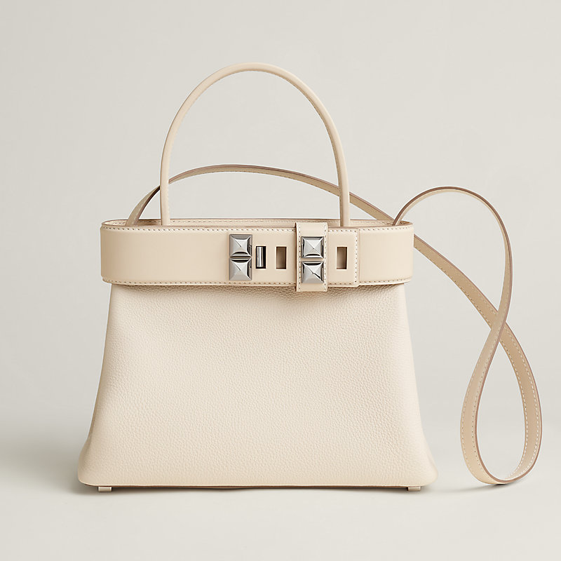 バッグ 《メドール》 スタッズ - レッド | Hermès - エルメス-公式サイト