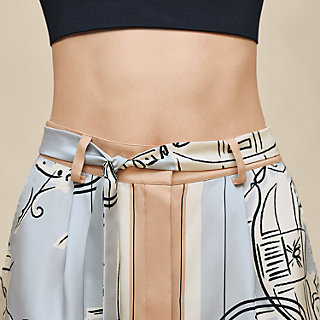 ボタン付きスカート 《エクスリブリス・ア・マン・ルヴェ》プリント